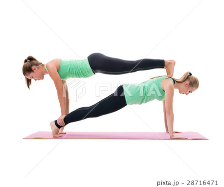 Sporty girls in green tops and leggings in studio Sporty girls in green tops and leggings in studio 28716471