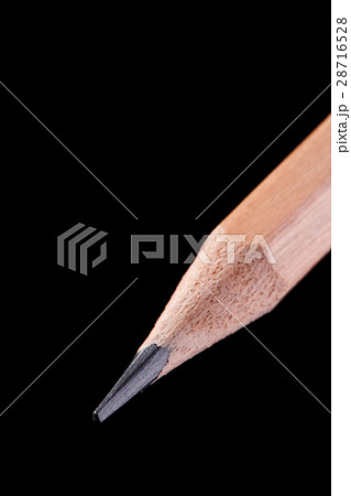 Wooden pencil isolated over black background 28716528