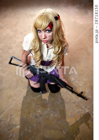 Japanese style cute schoolgirl holding mashingun 28718150