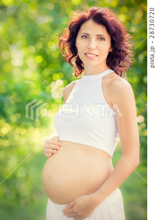 Beautiful belly of young pregnant woman 28730720