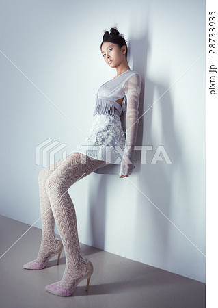 Futuristic sexy young asian woman in full lenght. Futuristic sexy young asian woman in full lenght. 28733935