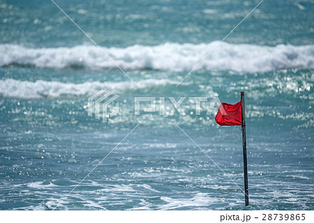 Red warning flag on beach Red warning flag on beach 28739865