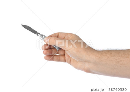 Hand with fish shaped knife Hand with fish shaped knife 28740520