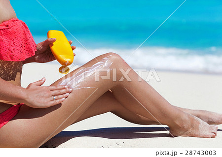 Healthy suntanning with SPF bodycare 28743003