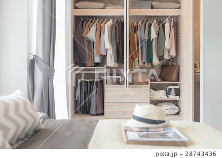 colorful clothes hanging on rail colorful clothes hanging on rail 28743436