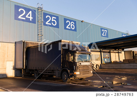 warehouse gates and truck loading warehouse gates and truck loading 28749763