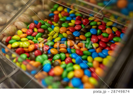 close up of multicolored dragee candies in box 28749874