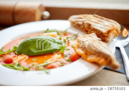 plate of delicious gazpacho soup at restaurant plate of delicious gazpacho soup at restaurant 28750101