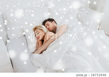 happy couple sleeping in bed at home happy couple sleeping in bed at home 28752646