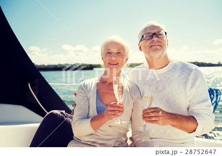 senior couple with glasses on sail boat or yacht senior couple with glasses on sail boat or yacht 28752647