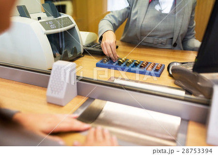 clerk counting cash money at bank office 28753394