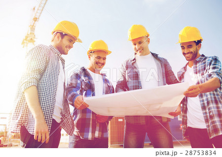 group of builders with tablet pc and blueprint 28753834