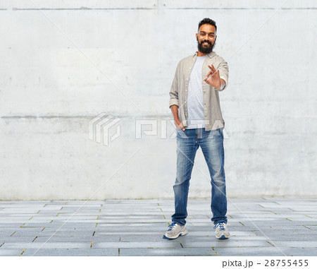 happy smiling indian man showing ok hand sign 28755455