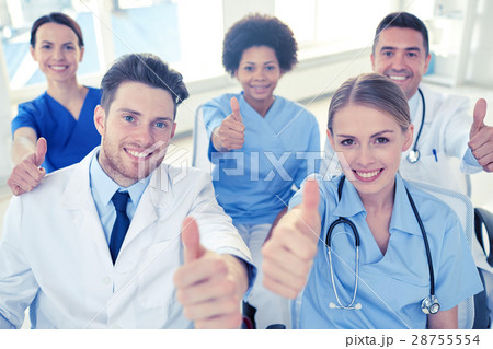 group of happy doctors on seminar at hospital group of happy doctors on seminar at hospital 28755554