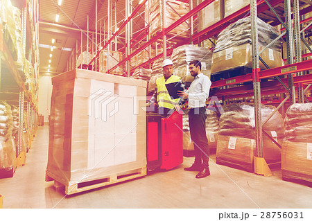 worker on forklift and businessman at warehouse worker on forklift and businessman at warehouse 28756031