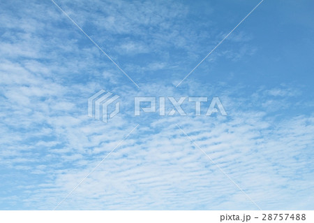 Blue sky background with white clouds closeup 28757488