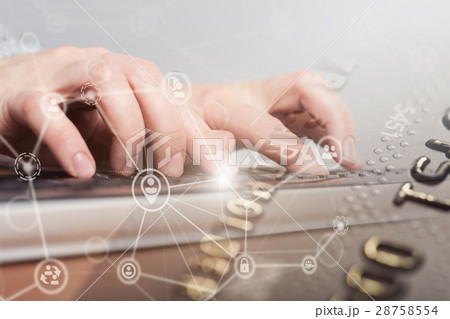 Female hand typing on laptop computer keyboard 28758554