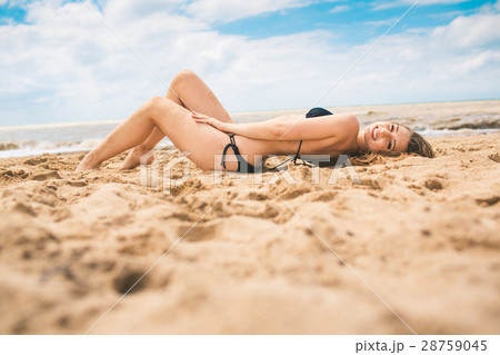 Beautiful young girl in bikini swimsuit rest on 28759045