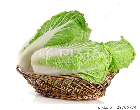 Chinese cabbage in a wicker basket isolated on Chinese cabbage in a wicker basket isolated on 28760774