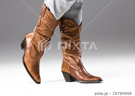 Legs in Jeans and Cowboys Boots Legs in Jeans and Cowboys Boots 28760998