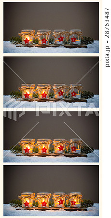 Four Advent candles in the snow, collage Advent 28763487