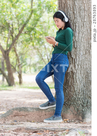 Young beautiful woman girl listening music Young beautiful woman girl listening music 28763893