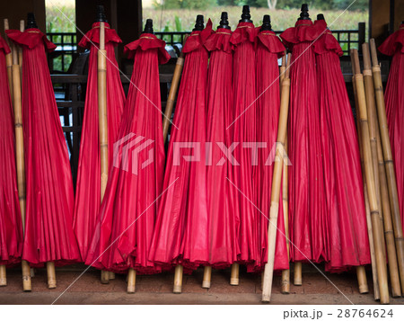 stack of red umbrella 28764624