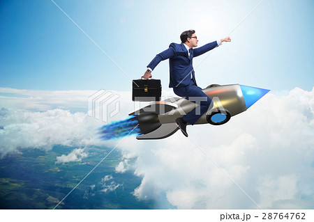 Businessman flying on rocket in business concept 28764762