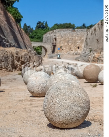 Ancient stone cannon ball in the fosse of Rhodes 28765100