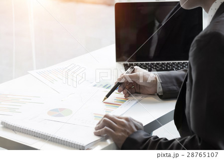 Businessman working in office with vintage tone. Businessman working in office with vintage tone. 28765107
