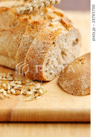 Close-up on traditional bread on wooden board 28765700