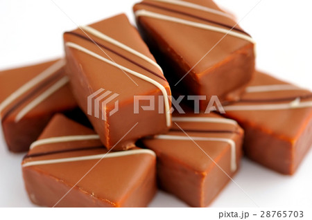 Chocolate praline on white background Chocolate praline on white background 28765703