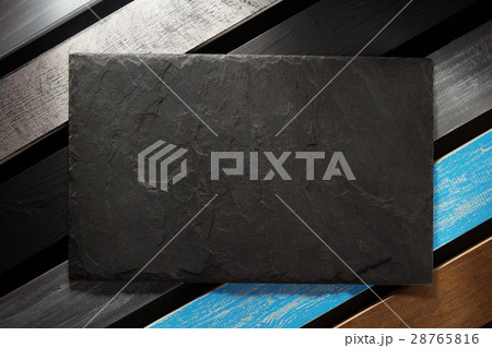 slate signboard at black 28765816