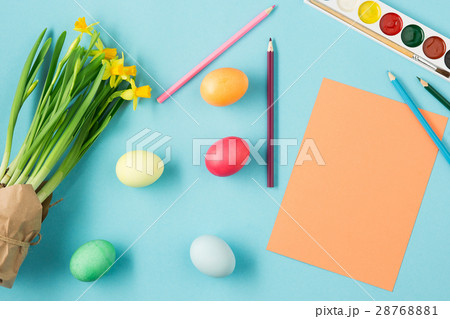 The top view of easter on blue table office The top view of easter on blue table office 28768881