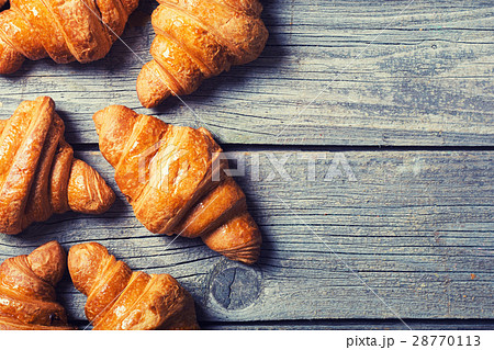 Tasty buttery croissants Tasty buttery croissants 28770113