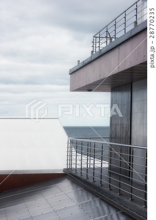 The house on the Baltic Sea in cloudy weather The house on the Baltic Sea in cloudy weather 28770235