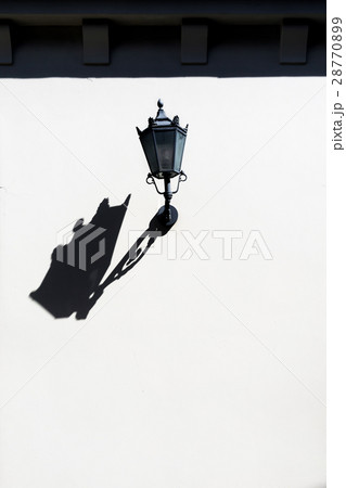 Street lamp on a clean wall Street lamp on a clean wall 28770899