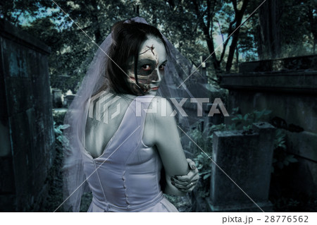 Dead bride, night cemetery on background Dead bride, night cemetery on background 28776562