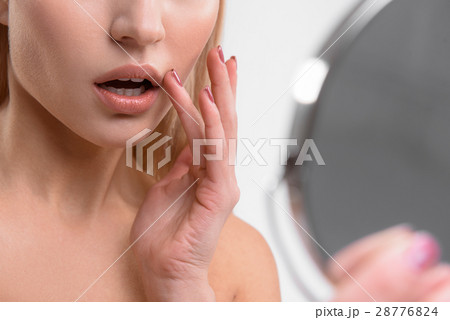 Voluptuous girl caring of her appearance 28776824