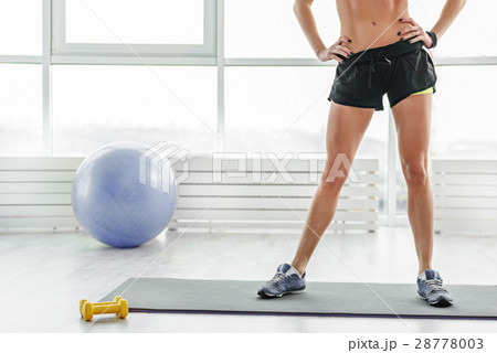 Sportive woman in light gym Sportive woman in light gym 28778003