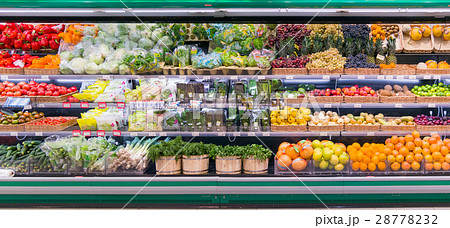 Fresh fruits and vegetables on shelf in 28778232