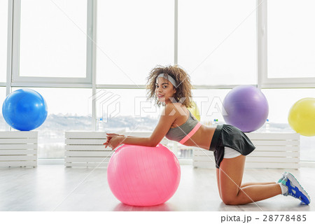 Sportive mulatto in light gym 28778485