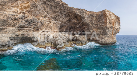 Rocks and blue sea 28779635