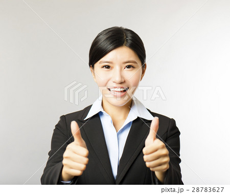 young smiling business woman with thumb up gesture young smiling business woman with thumb up gesture 28783627