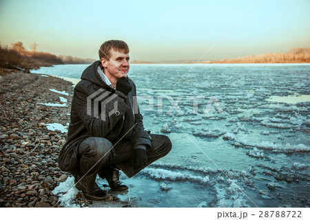 guy winter at the river 28788722