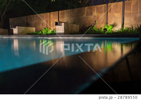 Peaceful pool reflections with soft water lighting 28789550
