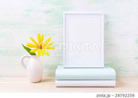 White frame mockup bright yellow flowers and books 28792256