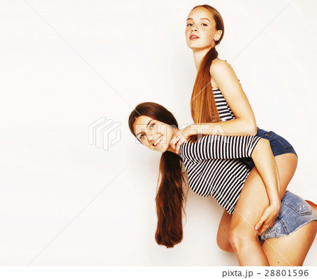 two cute teenagers having fun together isolated on 28801596