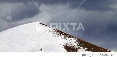 Panoramic view on off piste slope and gray sky 28806137