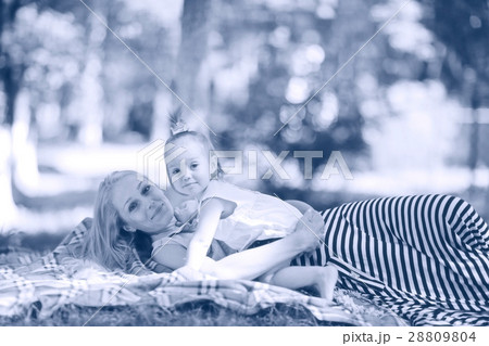 Mother hugging little daughter portrait 28809804